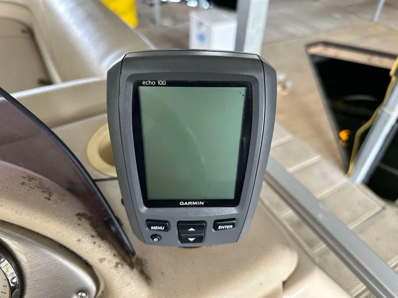 Slide: The Image of Garmin Echo 100 fishfinder on 2013 G3 SunCatcher V322 RC boat dashboard. - 4