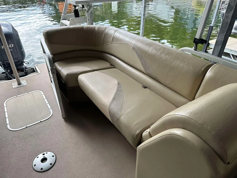Slide: The Image of 2013 G3 SunCatcher V322 RC boat interior with beige seating and water view. - 7