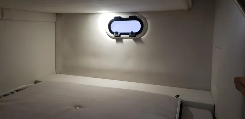 Slide: The Image of 2025 Regal 26 XO boat interior with modern helm and seating. - 14