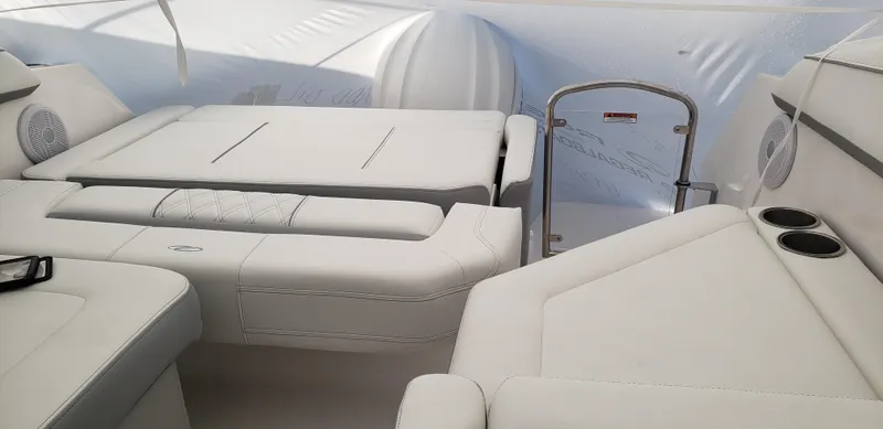 Slide: The Image of Engine compartment of 2025 Regal 26 XO boat, featuring a neatly organized engine and components. - 20