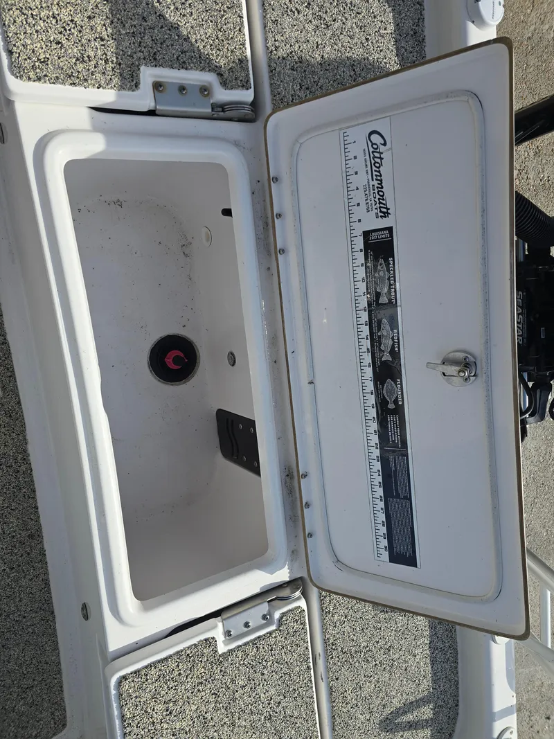 Slide: The Image of Open storage compartment on a 2019 Blue Wave 2200 PureBay boat. - 19