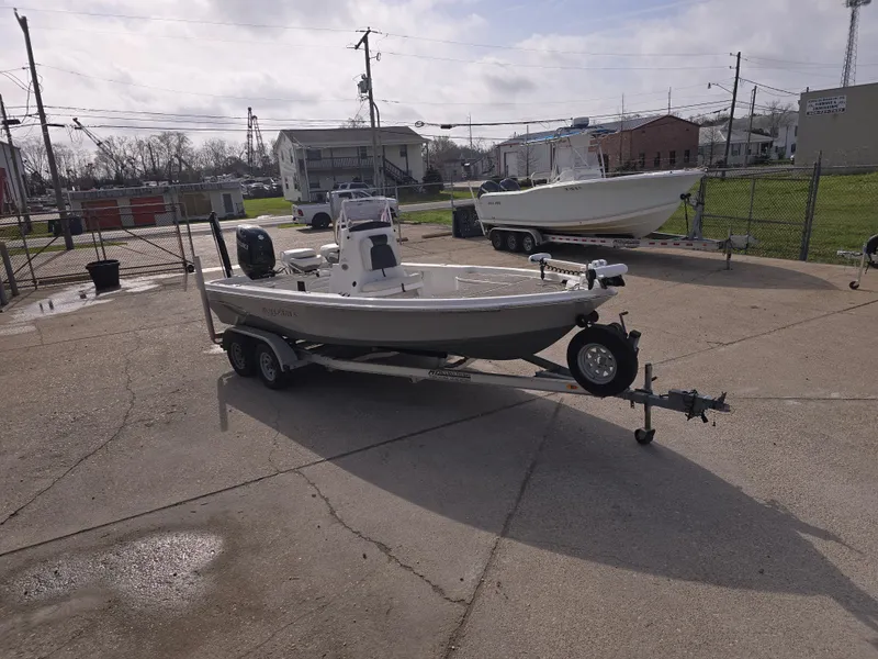 Slide: The Image of 2019 Blue Wave 2200 PureBay boat on trailer in outdoor lot. - 3