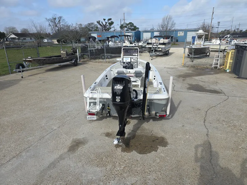 Slide: The Image of 2019 Blue Wave 2200 PureBay boat with 150 HP engine in a boatyard. - 5