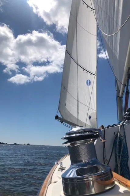 Slide: The Image of Sailing on a 2003 Alerion Express 28 under clear blue skies. - 10