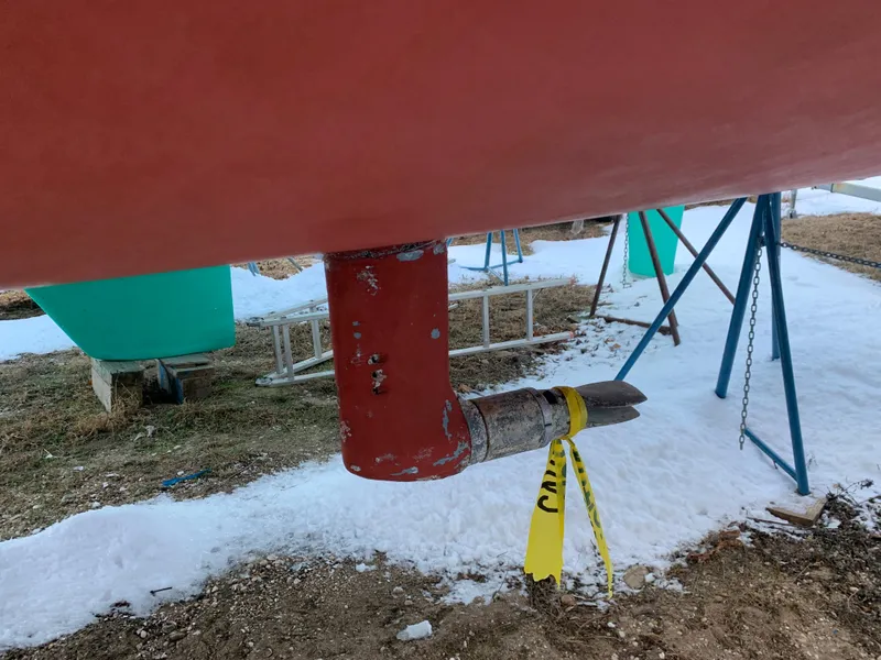 Slide: The Image of Bottom view of a 2003 Alerion Express 28 sailboat on a snowy ground. - 15