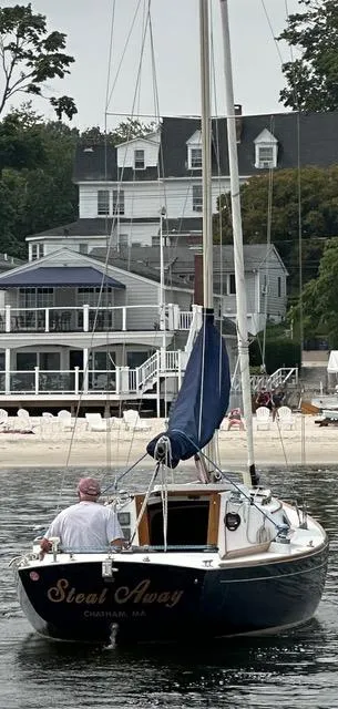 Slide: The Image of Sailboat "Steal Away" Alerion Express 28, 2003, near coastal homes. - 2