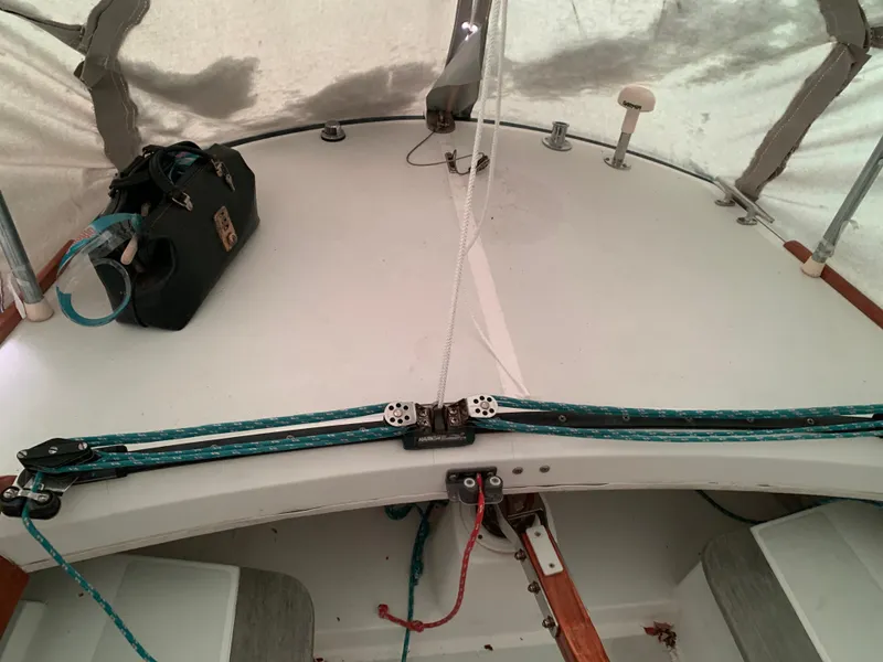 Slide: The Image of Interior view of a 2003 Alerion Express 28 sailboat cockpit with rigging details. - 29