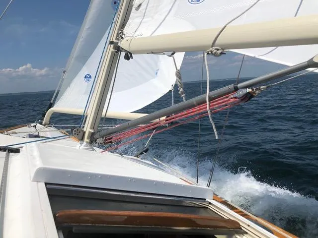 Slide: The Image of Sailing on a 2003 Alerion Express 28, cutting through ocean waves. - 3