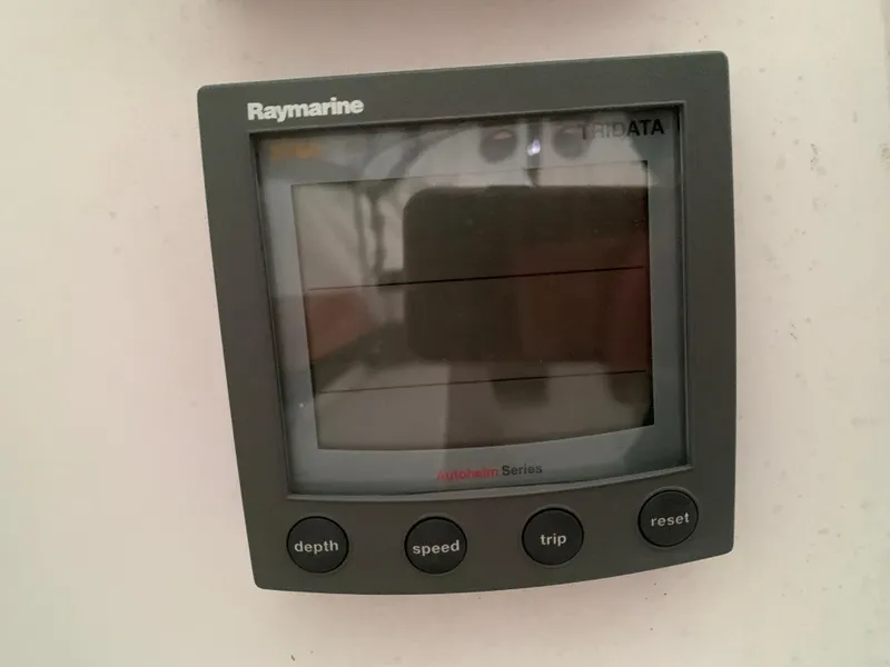 Slide: The Image of Raymarine display on 2003 Alerion Express 28 sailboat, showing depth, speed, and trip options. - 34