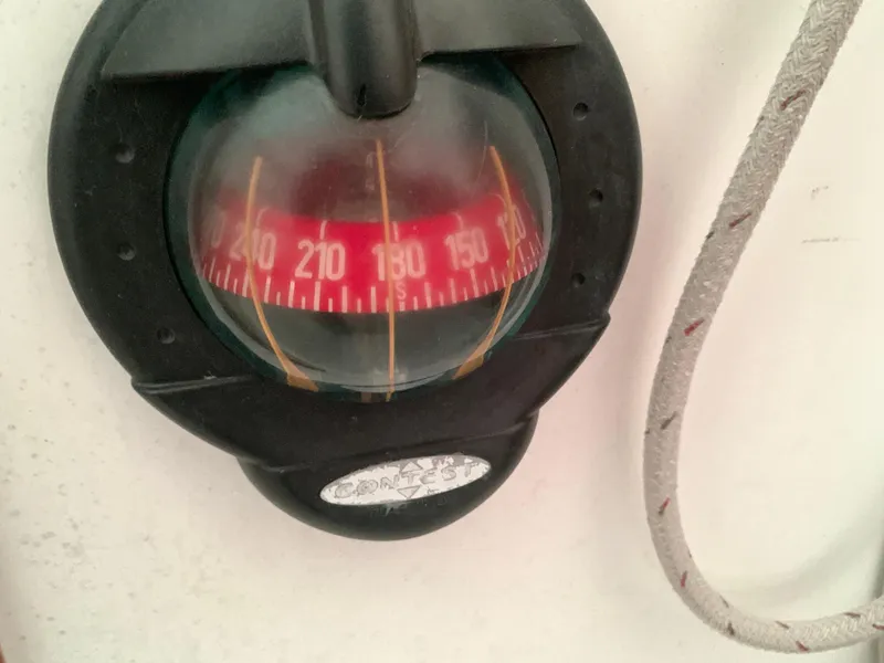 Slide: The Image of Compass on 2003 Alerion Express 28 sailboat, showing heading direction. - 35