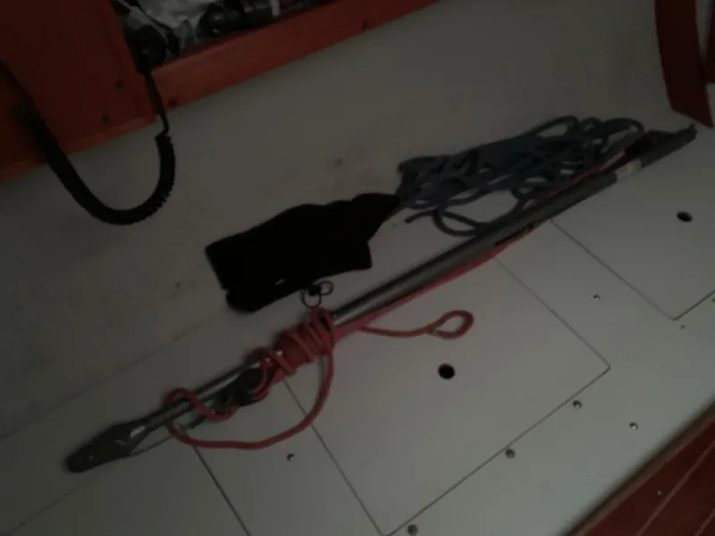 Slide: The Image of Interior of 2003 Alerion Express 28 sailboat with ropes and equipment. - 37