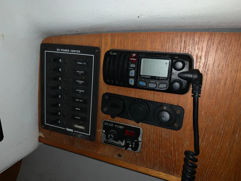 Slide: The Image of Control panel of a 2003 Alerion Express 28 sailboat with radio and switches. - 40