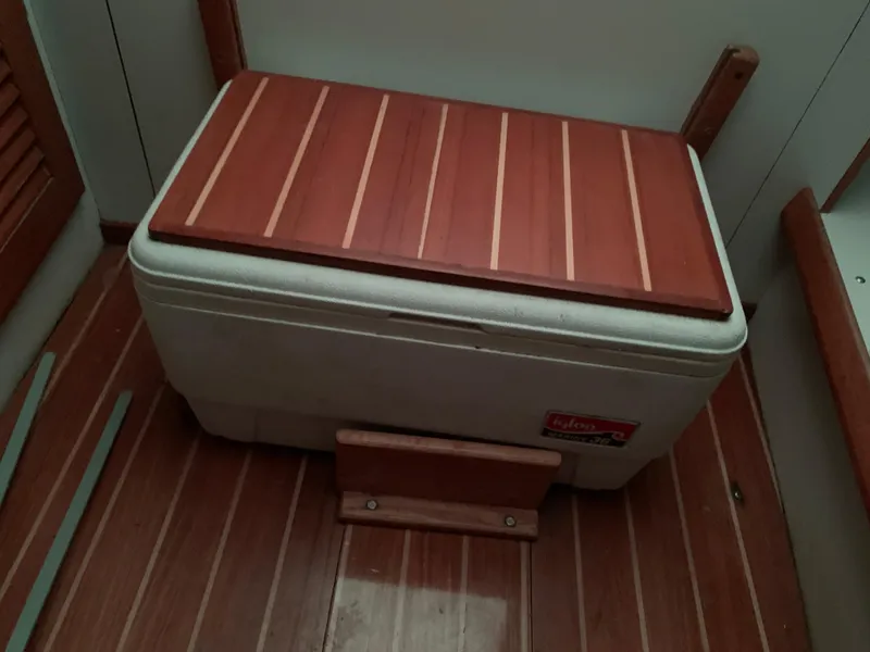 Slide: The Image of Wooden bench seat on 2003 Alerion Express 28 boat interior. - 44