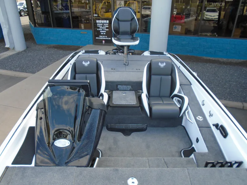 Slide: The Image of 2025 Phoenix 721 ZXL boat interior with seating and control panel. - 11