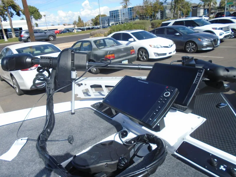 Slide: The Image of 2025 Phoenix 721 ZXL boat dashboard with advanced navigation systems and controls. - 14