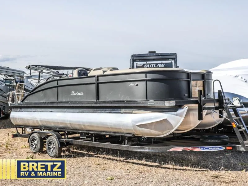 Slide: The Image of 2023 Aria 22UC pontoon boat on trailer at Bretz RV & Marine dealership. - 1
