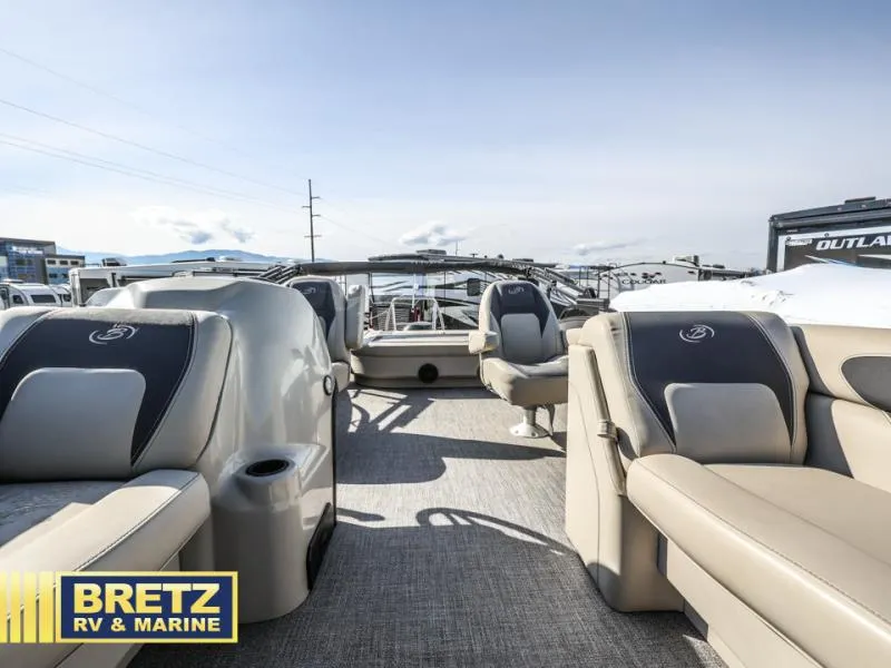 Slide: The Image of 2023 Aria 22UC boat interior with plush seating at Bretz RV & Marine. - 10