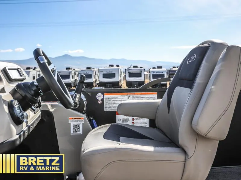 Slide: The Image of Interior of 2023 Aria 22UC boat with steering wheel and seat, Bretz RV & Marine. - 16