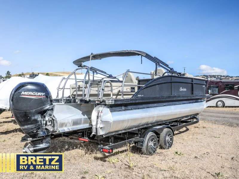 Slide: The Image of 2023 Aria 22UC pontoon boat with Mercury engine on trailer at Bretz RV & Marine. - 3