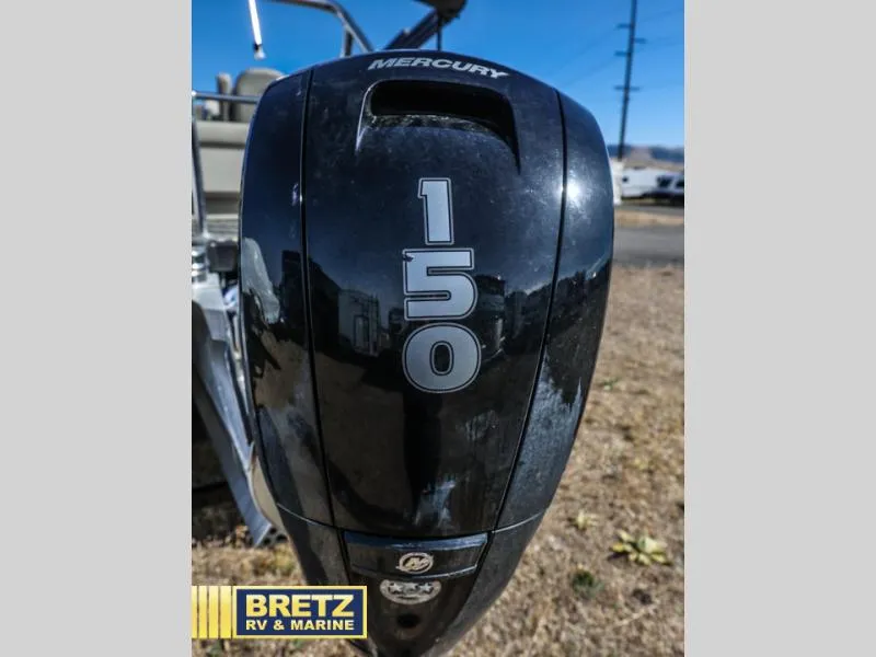 Slide: The Image of Mercury 150 outboard motor on Aria 22UC, 2023 model, displayed at Bretz RV & Marine. - 7
