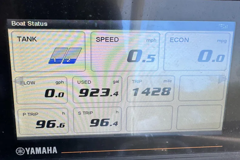 Slide: The Image of Boat status display showing fuel usage, speed, and trip data for 2020 World Cat 28 DCX. - 11