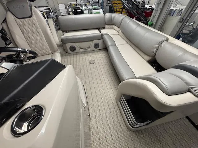 Slide: The Image of 2019 Harris Grand Mariner 250 interior with luxurious seating and modern design. - 13