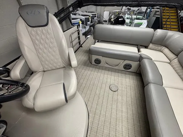 Slide: The Image of 2019 Harris Grand Mariner 250 interior with luxurious seating and modern design. - 15