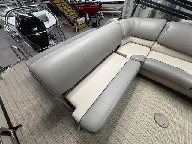 Slide: The Image of 2019 Harris Grand Mariner 250 boat interior with gray leather seating. - 17
