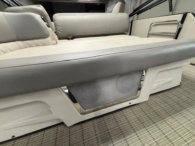 Slide: The Image of 2019 Harris Grand Mariner 250 interior seating with gray and white upholstery. - 24
