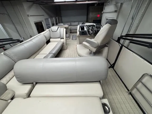 Slide: The Image of 2019 Harris Grand Mariner 250 interior with luxurious seating and modern helm. - 26