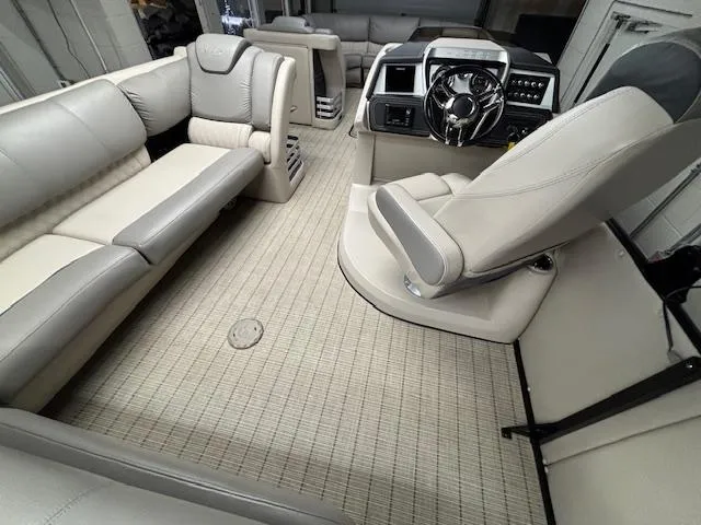 Slide: The Image of 2019 Harris Grand Mariner 250 interior with plush seating and modern helm. - 27