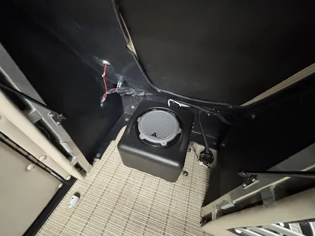 Slide: The Image of Interior of 2019 Harris Grand Mariner 250 showing speaker and wiring setup. - 36