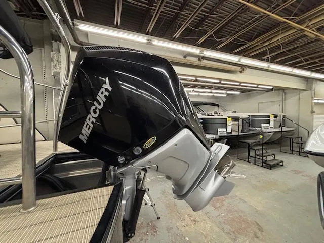 Slide: The Image of 2019 Harris Grand Mariner 250 with Mercury outboard motor in a showroom. - 40