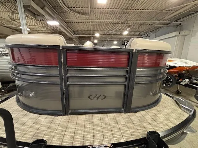 Slide: The Image of 2019 Harris Grand Mariner 250 pontoon boat in indoor showroom. - 6