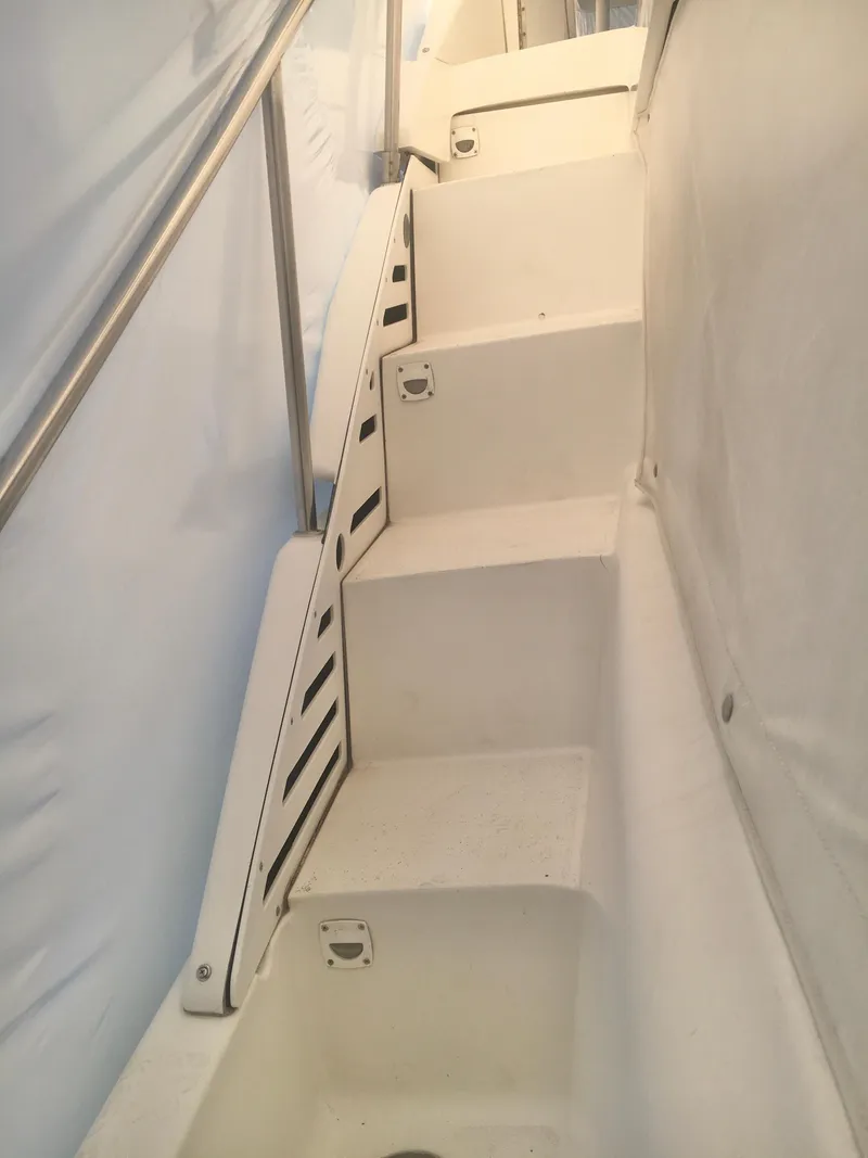 Slide: The Image of Staircase on 1996 Silverton 372 Motor Yacht with white steps and metal railing. - 25