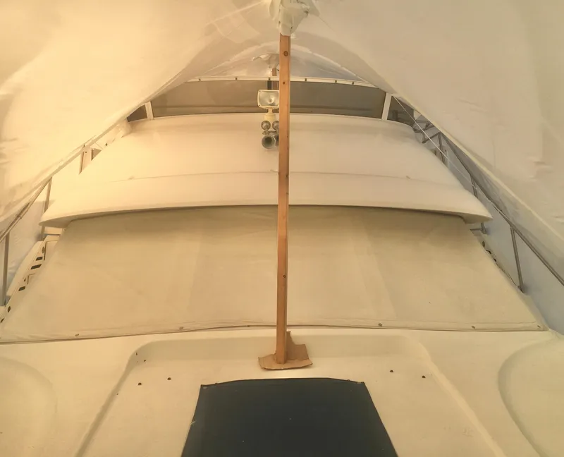 Slide: The Image of 1996 Silverton 372 Motor Yacht interior under protective cover. - 5