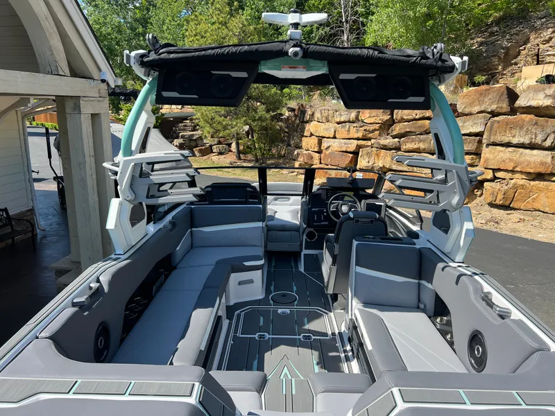 Slide: The Image of 2024 Supra SL boat interior with sleek seating and modern design features. - 13