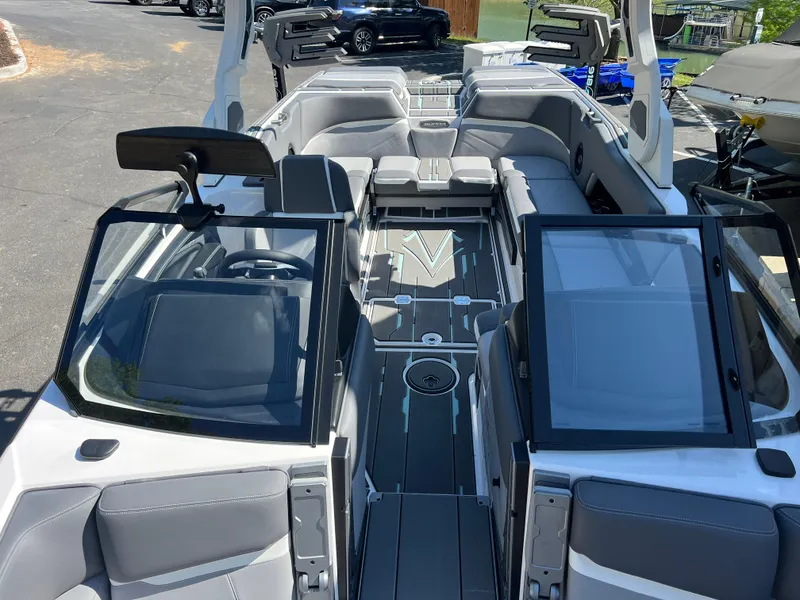 Slide: The Image of 2024 Supra SL boat interior with sleek seating and modern design. - 20