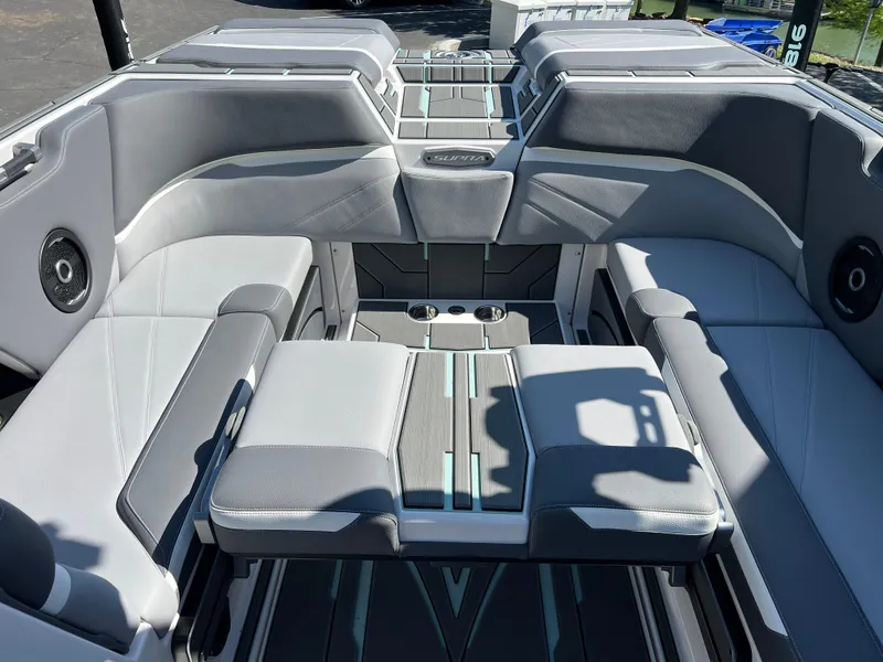 Slide: The Image of 2024 Supra SL boat interior with gray seating and modern design. - 26