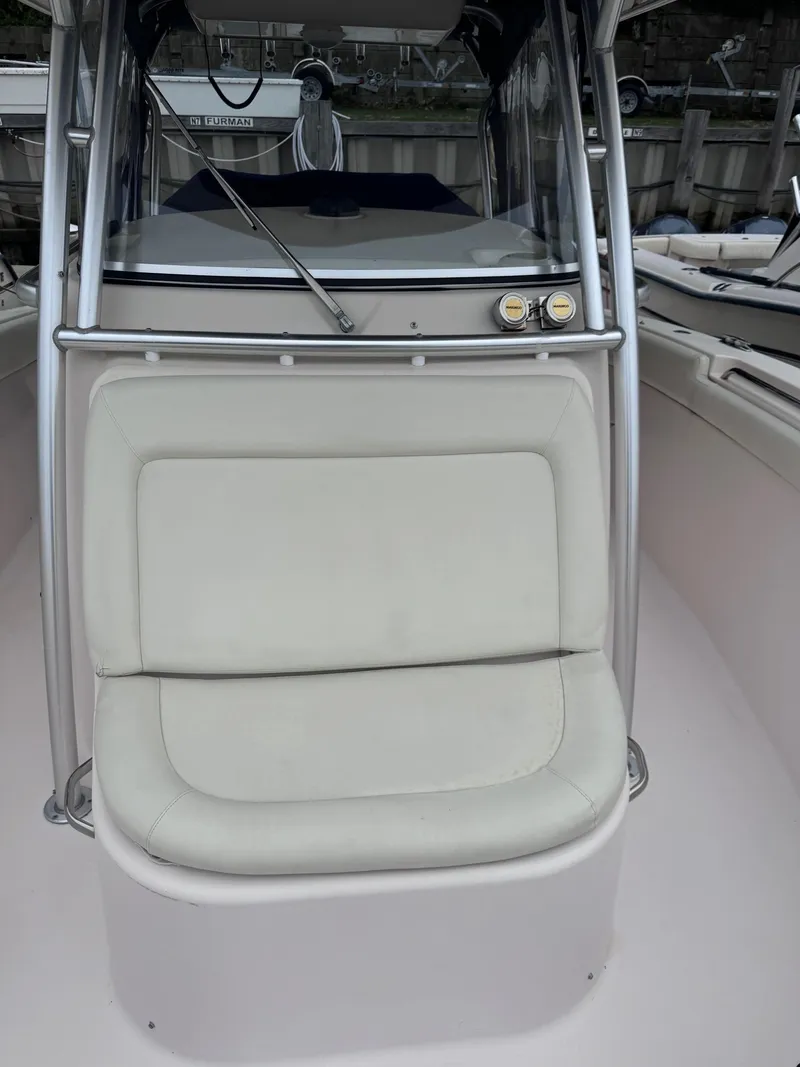 Slide: The Image of 2008 Grady-White 336 Canyon boat with cushioned seating and stainless steel frame. - 41