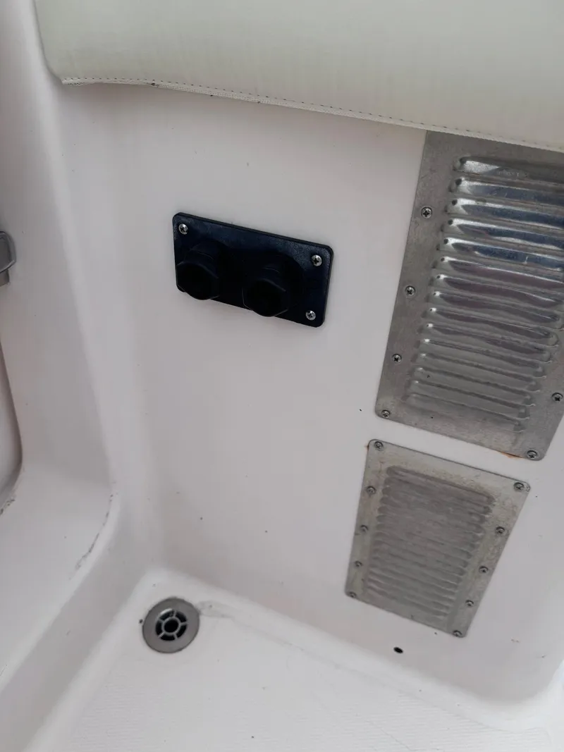 Slide: The Image of 2008 Grady-White 336 Canyon boat interior with metal plates and drainage. - 42