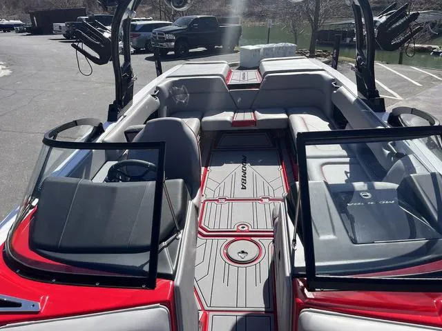 Slide: The Image of 2024 Moomba Mojo boat interior with sleek seating and modern design. - 18