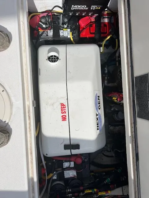 Slide: The Image of Engine compartment of 2008 Fountain 33 SFC Sportfish Cruiser with NOCO Genius battery charger. - 19