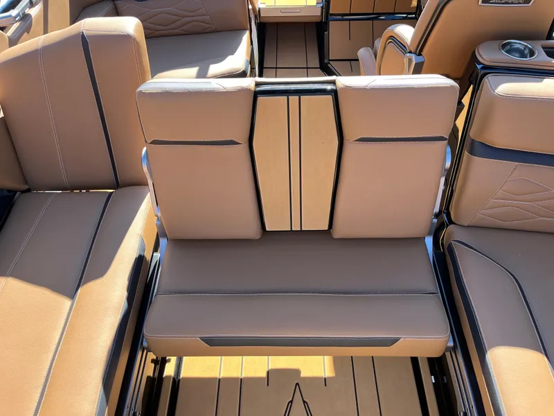 Slide: The Image of 2025 Supra SE interior with tan leather seats and modern design. - 16