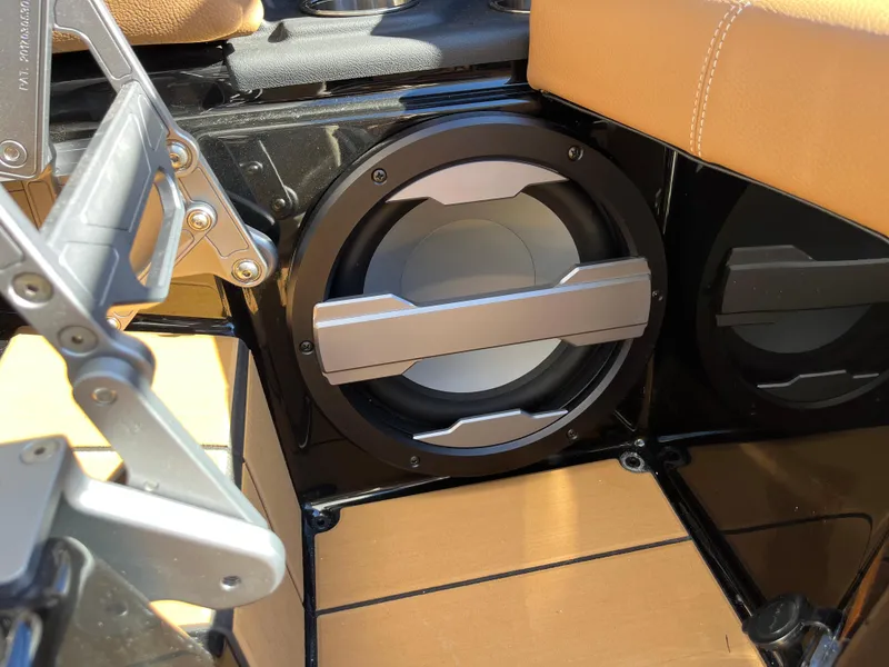 Slide: The Image of 2025 Supra SE interior speaker system with sleek design and premium materials. - 19