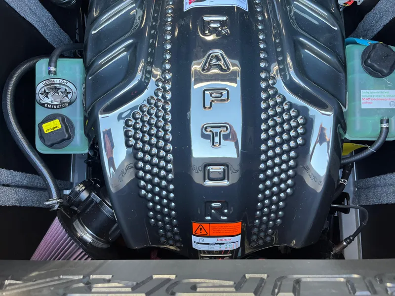 Slide: The Image of 2025 Supra SE engine with Raptor branding, featuring a sleek metallic design. - 9