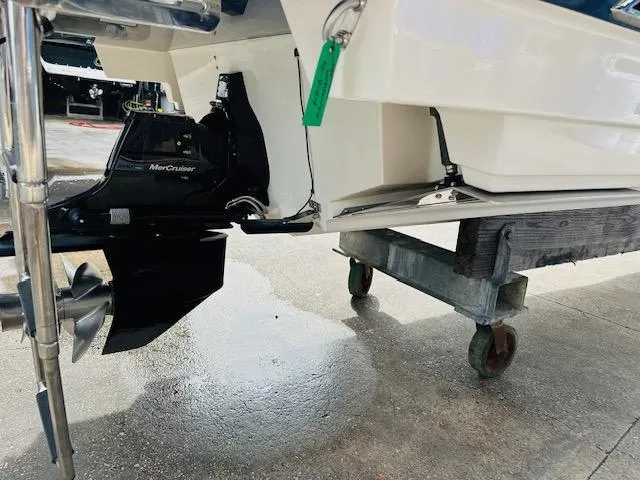 Slide: The Image of 2016 Sea Ray 250 SLX boat with MerCruiser engine on a wheeled platform. - 7