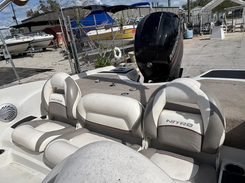 Slide: The Image of 2015 Nitro Z-7 Sport boat interior with seating and Mercury outboard motor. - 21