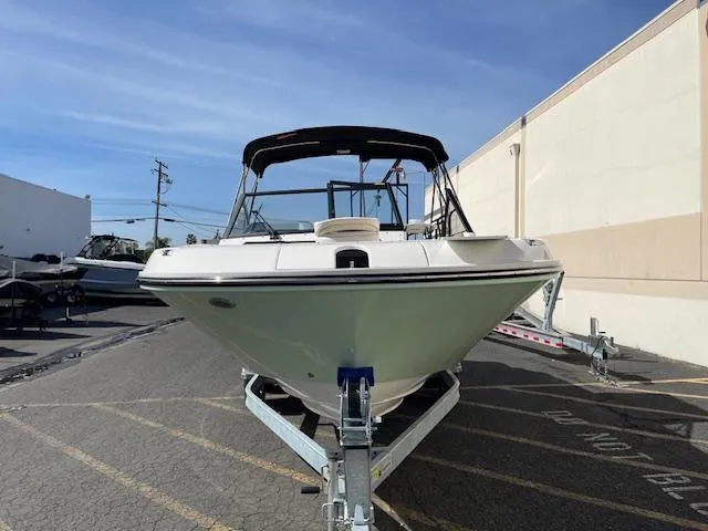 Slide: The Image of 2025 Bayliner TROPHY 22 SC boat on trailer, parked outdoors. - 40