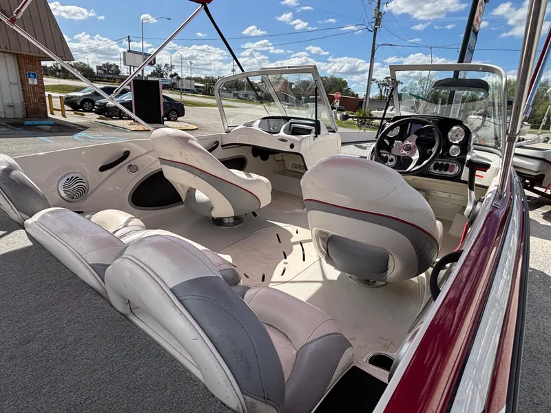 Slide: The Image of 2014 Nitro Z-7 boat interior with seating and dashboard, parked on trailer. - 14